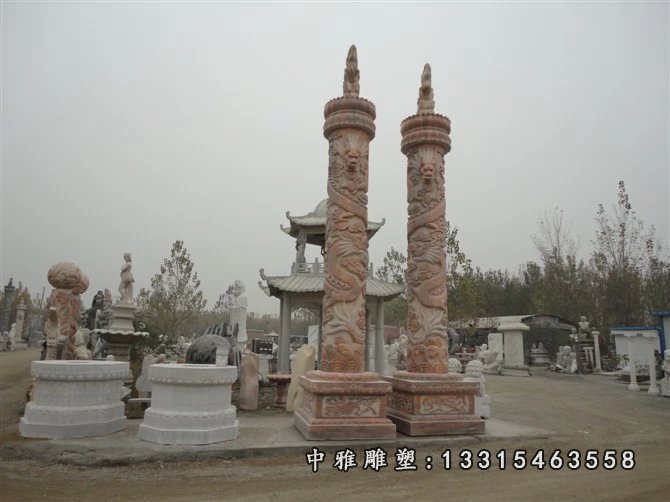盘龙柱石雕，晚霞红石柱雕塑