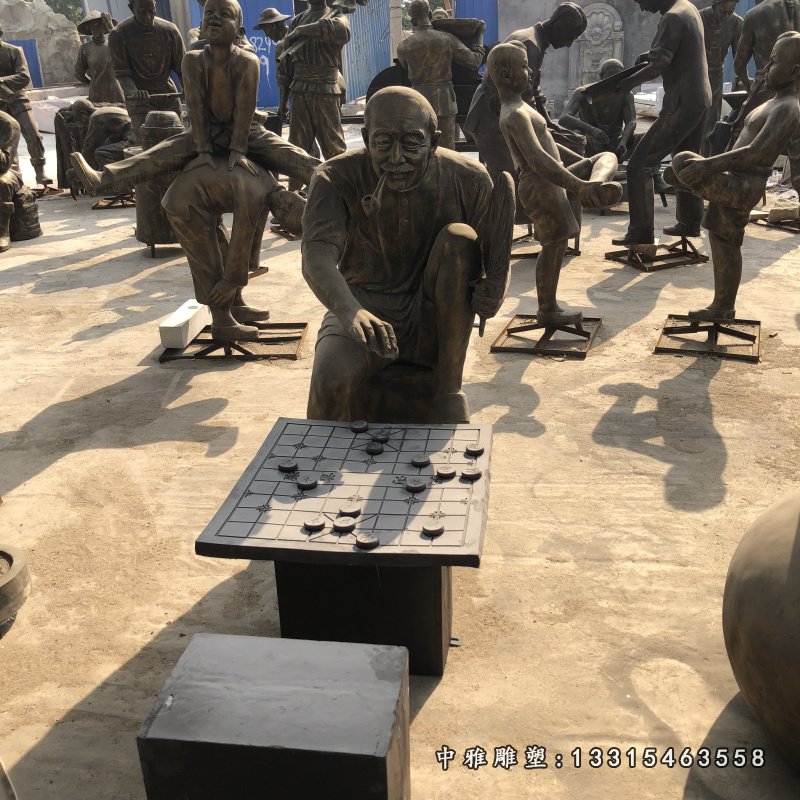 商业街下象棋人物小品铜雕