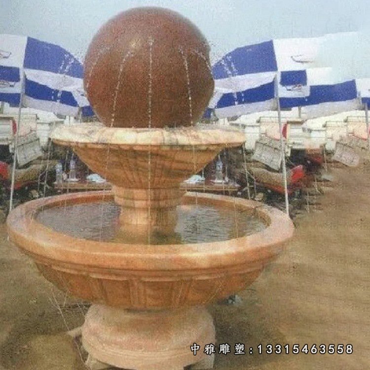 晚霞红石雕风水球喷泉