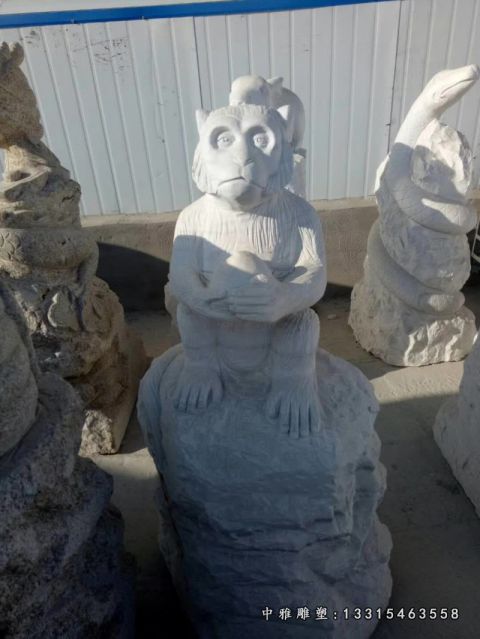 石雕抱桃猴子雕塑