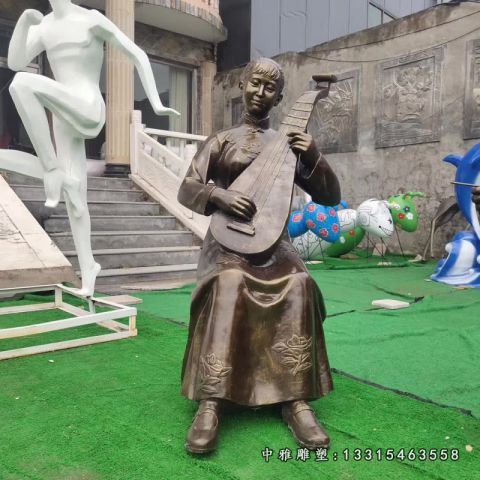 铜雕步行街表演人物