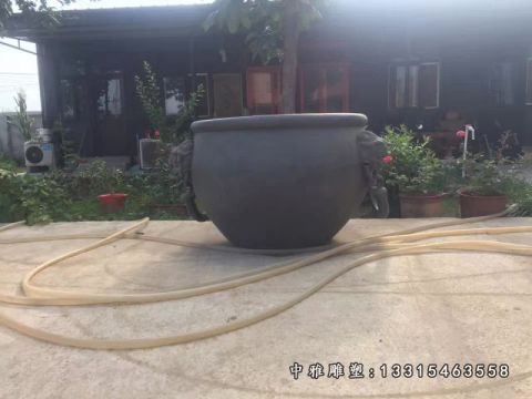 圆形铜雕水缸雕塑