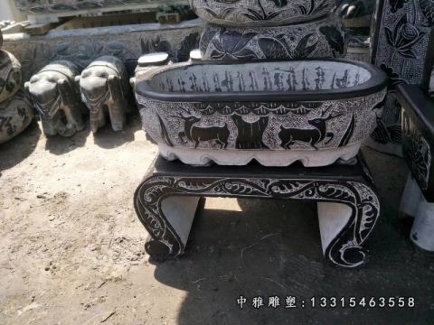 仿古石雕花盆景观