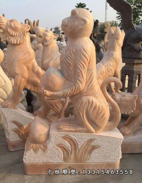 猴子抱桃石雕