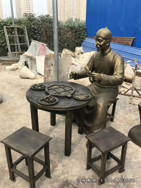 步行街吃饭人物铜雕