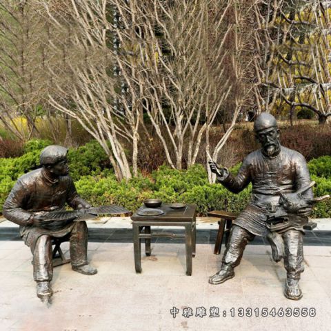 铜雕画风筝人物雕塑